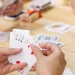 What are the basic things that people will be learning after playing the game of Rummy?